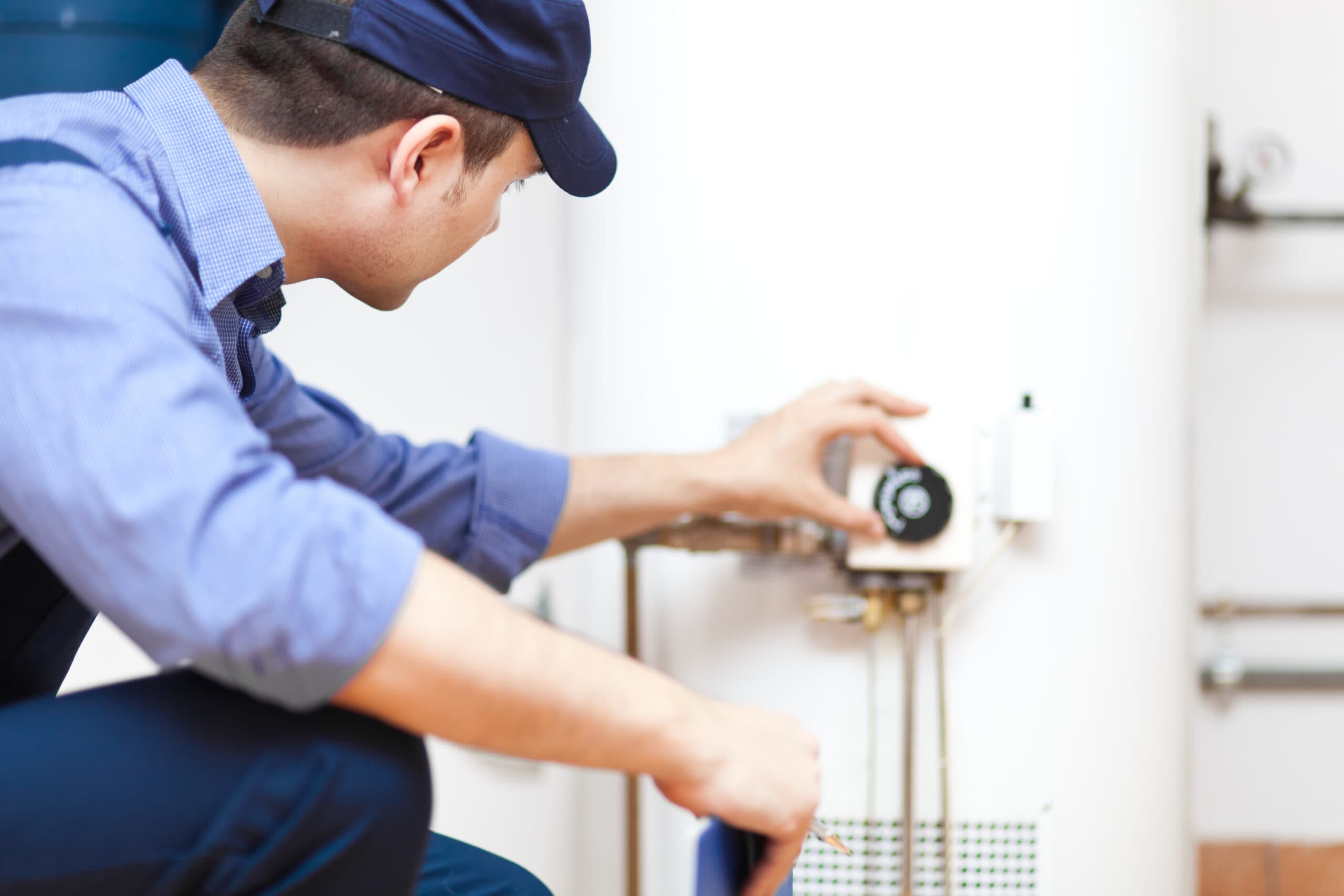 Halo Heating engineer servicing a boiler